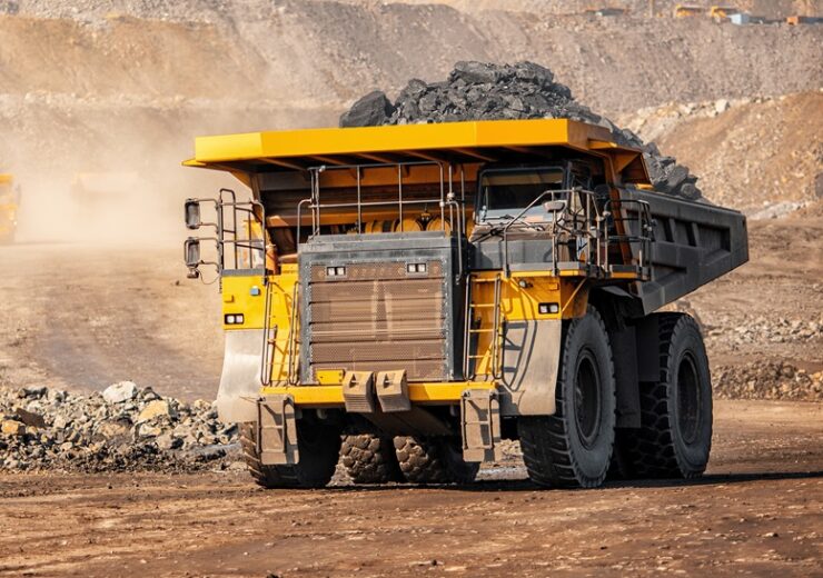 Open pit mine industry, big yellow mining truck for coal anthracite